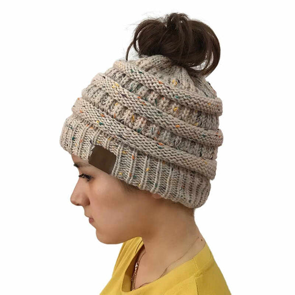 Trendy Junque beanietail gorgeous girl wears warm beige knitted cap