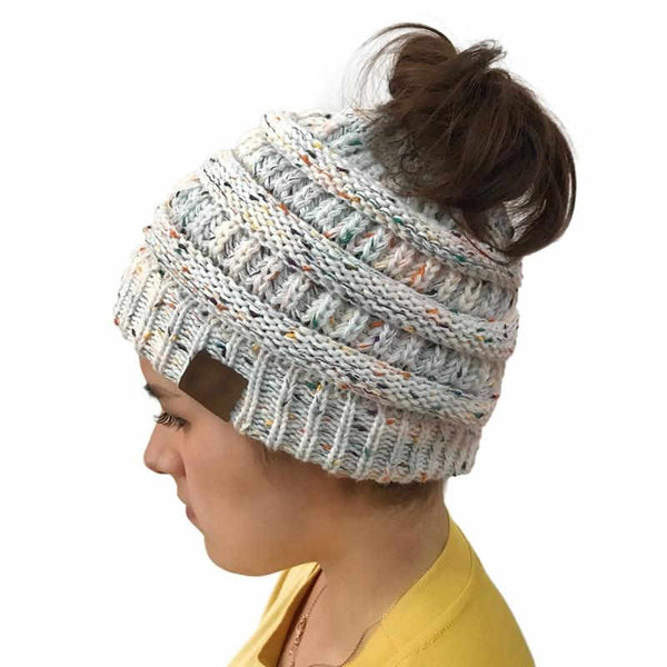 Gift for woman wearing a white beanie with hair through ponytail hairdo