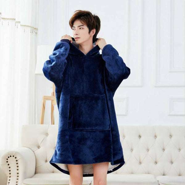 Asian attractive male, wear a velvet blue pullover throw blanket, with two hands holding the hood